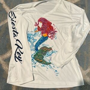 Mermaid sun shirt from local town Siesta Key, Florida. Never worn.
